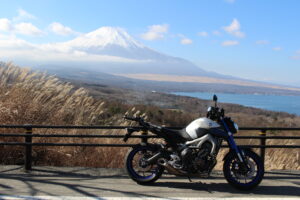 Adventure motorcycle parked with Mount Fuji landscape in Japan