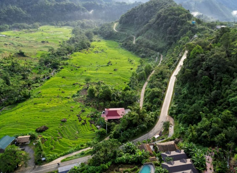 Mountain valley landscape with winding road